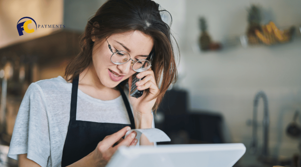 A person contacting the issuing bank or credit union to verify a check